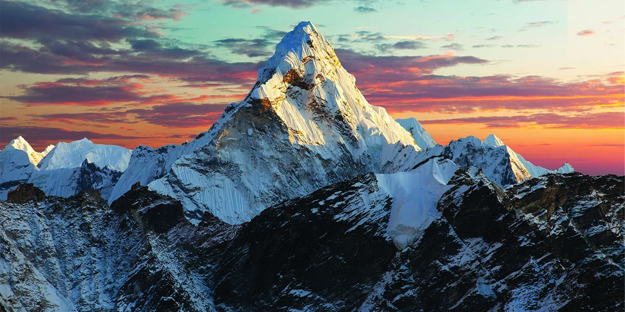 Snow-covered mountain peaks representing life’s challenges and learning how to pray for breakthrough.