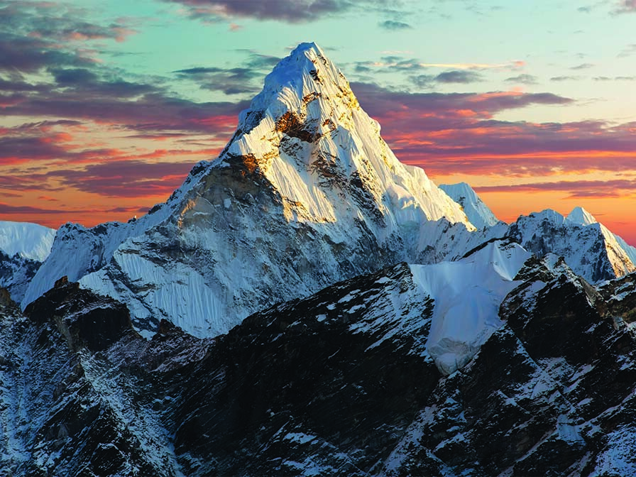 Snow-covered mountain peaks representing life’s challenges and learning how to pray for breakthrough.