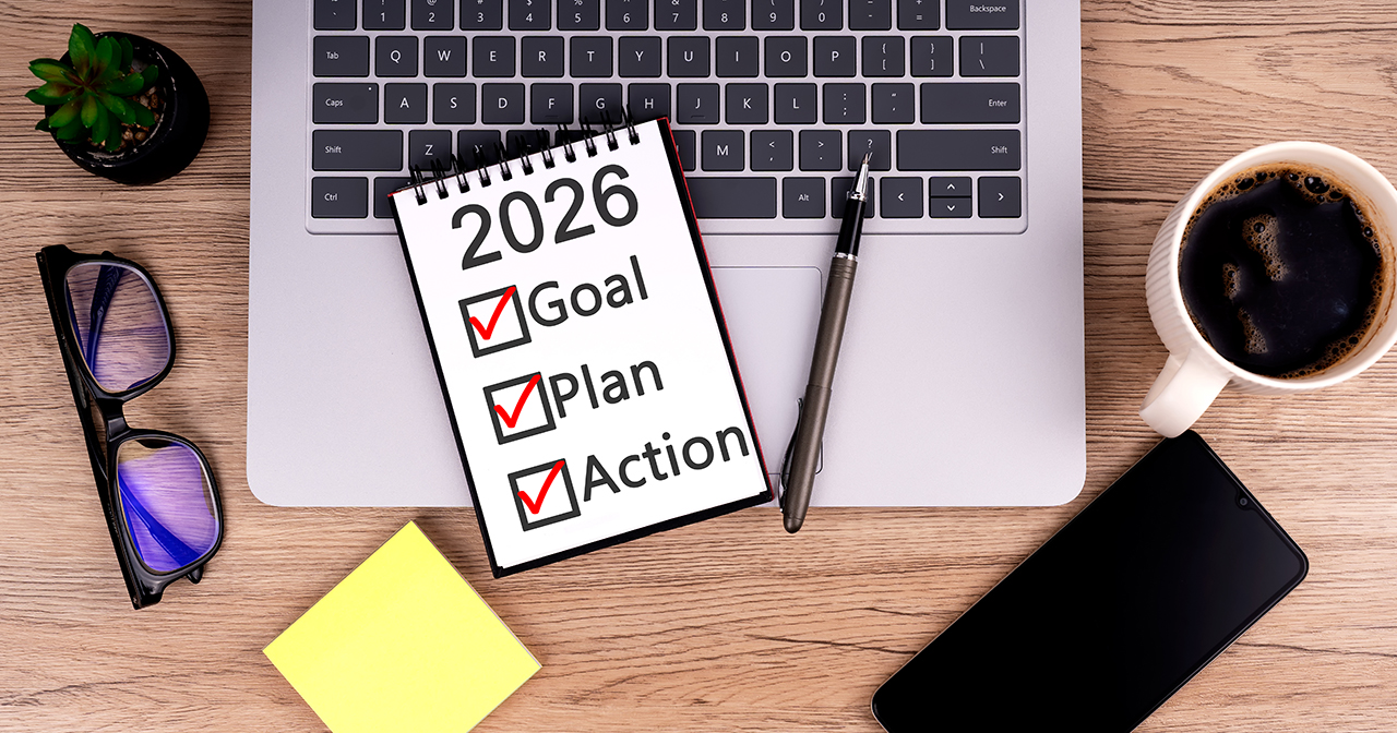 writing new year goals in a journal to plan for 2026