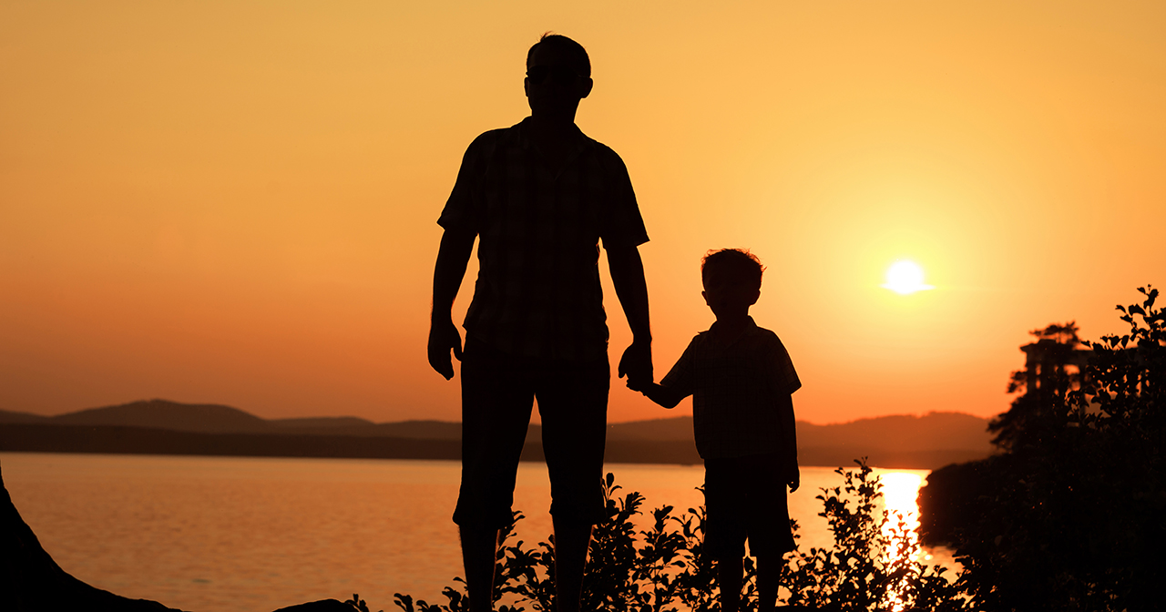 Raising Faithful Kids in a Culture That's Lost Its Way shows a parent and child silhouetted at sunset. It offers biblical advice for parenting, as well as perspective.