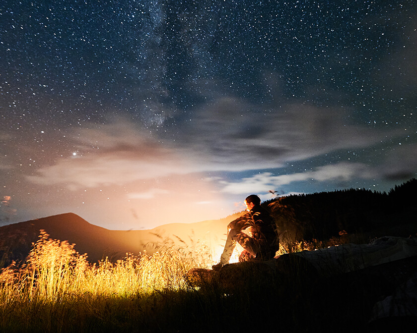 Midnight Moment of someone looking into the night sky, hoping for spiritual renewal.