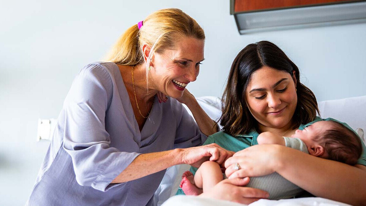 Grandmother rejoicing for her granddaughter after breast cancer healing