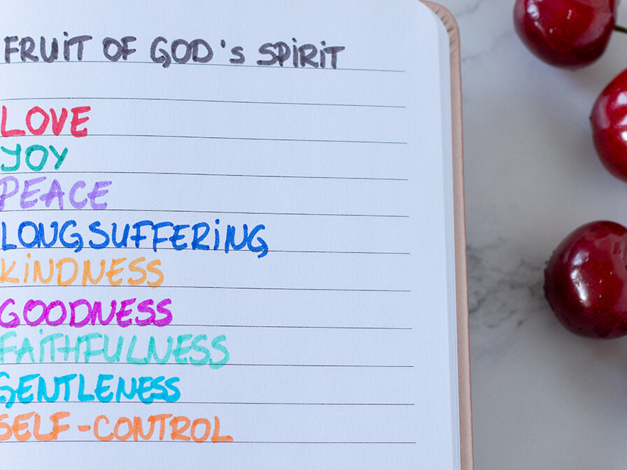 page in a notebook with a list of the 9 fruit of God's spirit