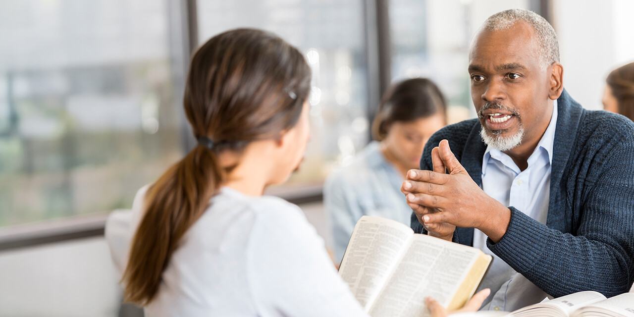 Person boldly sharing the Gospel with others.