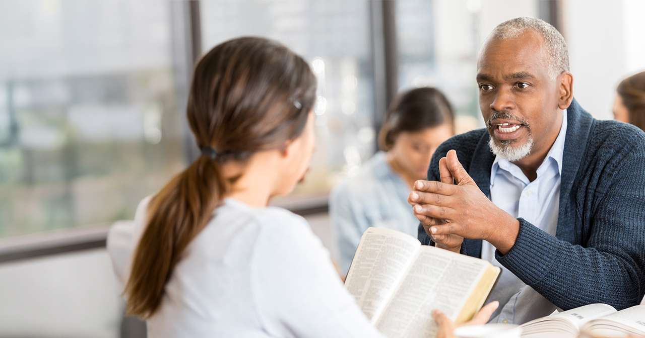 Person boldly sharing the Gospel with others.