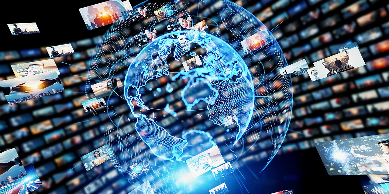 Holographic globe showing global media connections with images representing different continents.
