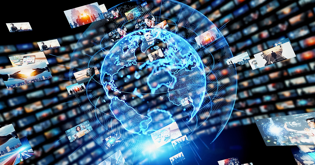 Holographic globe showing global media connections with images representing different continents.