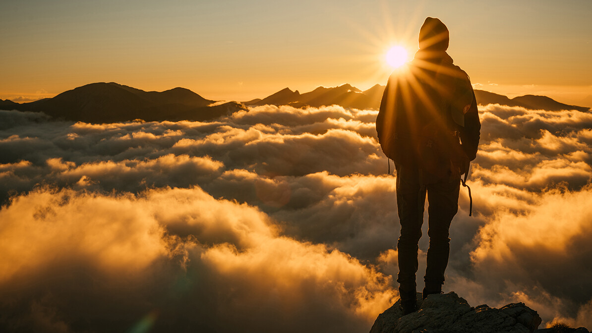 when you can’t see God working, man looking at fog from mountaintop